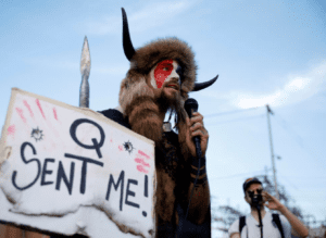 How the Q-Anon Conspiracy Threatens Democracy